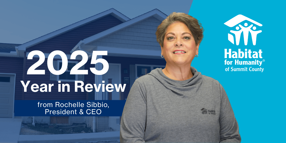 Rochelle in front of house 2025 year in review with logo