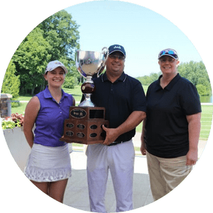 Golf winners with trophy